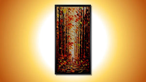Handgemaltes Ölbild roter Herbstwald mit Waldweg auf Leinwand, Hochformat in Rot und Orange, Spachteltechnik, mit schwarzem Rahmen – Beispiel im Raum