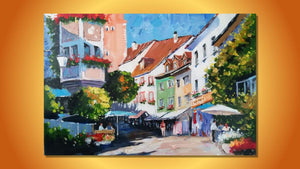 Handgemaltes Ölbild bunte Altstadtgasse mit Cafés auf Leinwand, farbenfroh mit Spachtel gemalt – Beispiel im Raum