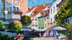 Handgemaltes Ölbild bunte Altstadtgasse mit Cafés auf Leinwand, farbenfroh mit Spachtel gemalt – Detailansicht