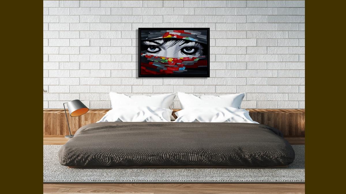 Handgemaltes Ölbild ausdrucksstarke Augen auf Leinwand, Schwarz-Weiss-Gesicht mit bunten Spachteltüchern, mit schwarzem Rahmen – Beispiel im Raum