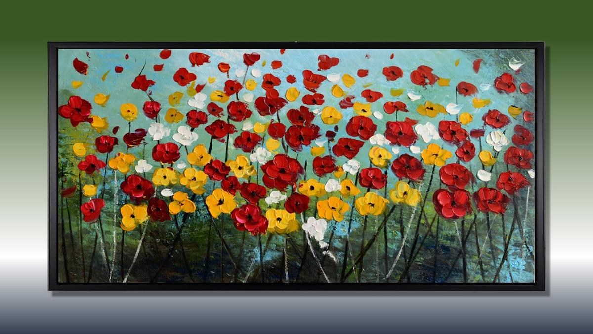 Handgemaltes Ölbild bunte Blumenwiese auf Leinwand, rote, gelbe und weisse Blüten vor türkisem Himmel, mit schwarzem Rahmen – Beispiel im Raum