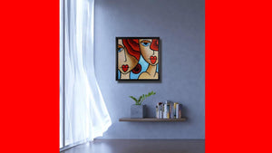Handgemaltes Ölbild zwei Frauen im Kubismus-Stil auf Leinwand, rote Haare, Herzlippen, hellblauer Grund, mit schwarzem Rahmen – Beispiel im Raum